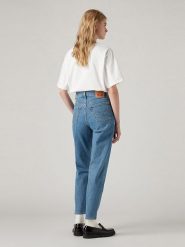 Levi's Dżinsy - Mom fit - w kolorze niebieskim rozmiar: W30/L29. Niebieskie jeansy Levi's®, l, z aplikacjami, z podwyższonym stanem. Za 144.92 zł.