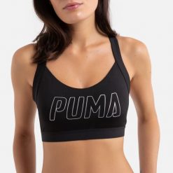 Biustonosz stanik sportowy Puma Drycell. Czarne koszulki sportowe Puma, bez wzorów, bez ramiączek, na fitness i siłownię. Za 49.90 zł.