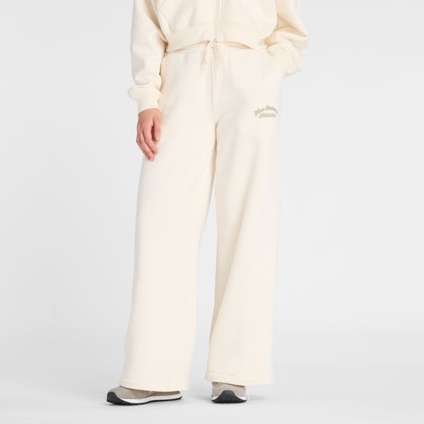 Spodnie damskie New Balance WP53902PEF – beżowe. Brązowe spodnie materiałowe New Balance, na co dzień, l, z aplikacjami, z bawełny, z podwyższonym stanem. Za 199.99 zł.