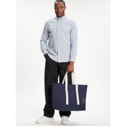 Torebka Tommy Hilfiger. Niebieskie shopper TOMMY HILFIGER, bez wzorów, bez dodatków. Za 269.99 zł.