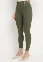 Ciemnozielone Legginsy z Wysokim Stanem Ozdobione Guzikami Kolithra. Zielone legginsy Born2be, l, bez wzorów, z jeansu, z podwyższonym stanem. Za 39.99 zł.