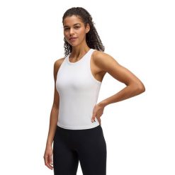 Top treningowy damski Under Armour Motion High Neck Tank. Białe koszulki sportowe Under Armour, bez wzorów, bez ramiączek. Za 119.99 zł.
