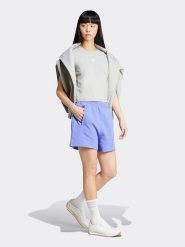 Adidas Szorty w kolorze błękitnym rozmiar: 110. Niebieskie szorty Adidas, bez wzorów, z bawełny. Za 136.45 zł.