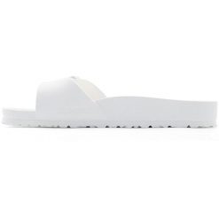 Klapki damskie Birkenstock Eva Madrid. Białe klapki Birkenstock, bez wzorów, z materiału, bez obcasa. Za 296.00 zł.