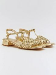 Bellucci Sandały w kolorze złotym rozmiar: 40. Żółte sandały Bellucci, bez wzorów, z otwartym noskiem, bez obcasa, na koturnie, bez zapięcia. Za 162.49 zł.