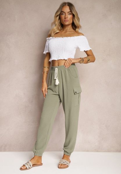 Ciemnozielone Spodnie Cargo High Waist Wykończone Gumką w Pasie Nellindra. Zielone spodnie materiałowe Renee, na co dzień, l, bez wzorów, z jeansu, z podwyższonym stanem. Za 49.99 zł.