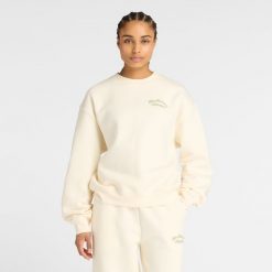 Bluza damska New Balance WT53516PEF – beżowa. Brązowe bluzy New Balance, m, bez wzorów, z bawełny, bez kaptura. Za 279.99 zł.