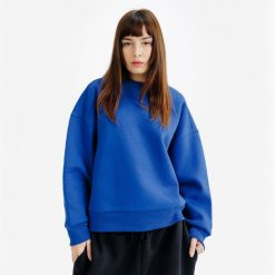 Bluza okrągły dekolt damska Elementals. Niebieskie bluzy DECATHLON, m, bez wzorów, z bawełny, bez kaptura. Za 149.99 zł.