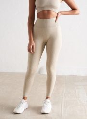 Damskie legginsy bezszwowe, prążkowane, wysoki stan, squat proof beżowe. Brązowe legginsy AIM'N, xs, bez wzorów, z dzianiny, z podwyższonym stanem. Za 254.00 zł.
