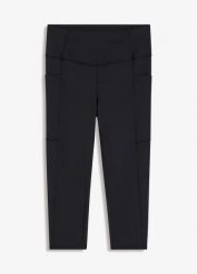 Wygodne legginsy sportowe z kieszonką na telefon, szybko schnące. Czarne legginsy bonprix, bez wzorów. Za 84.99 zł.