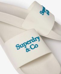 Superdry Klapki Company Logo High Build – Brilliant White/Mid Blue. Białe klapki Superdry, bez wzorów, z gumy, bez obcasa. Za 151.45 zł.