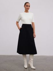 BGN Spódnica w kolorze czarnym rozmiar: 40. Czarne spódnice BGN, na co dzień, bez wzorów, z wełny, midi, proste. Za 126.15 zł.