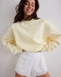 Damska bluza biegowa oddychająca, odprowadzająca wilgoć Le Run cytrynowa biel. Żółte bluzy sportowe AIM'N, s, bez wzorów, z bawełny, bez kaptura. Za 382.00 zł.
