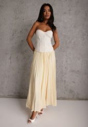 Żółta Spódnica High Waist Zdobiona Drobnym Plisowaniem Aniope. Żółte spódnice Renee, na co dzień, m, z aplikacjami, casualowe, maxi, dopasowane. Za 119.99 zł.