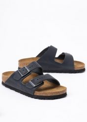 Klapki damskie BIRKENSTOCK ARIZONA LEOI. Brązowe klapki Birkenstock, bez wzorów, bez obcasa. Za 439.99 zł.
