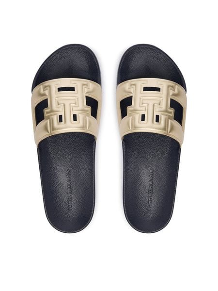 Tommy Hilfiger Klapki Th Pool Slide FW0FW09613 Złoty. Żółte klapki TOMMY HILFIGER, bez wzorów, ze skóry, bez obcasa. Za 189.99 zł.