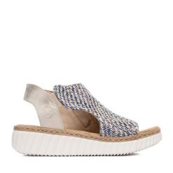 Sandały Rieker. Niebieskie sandały Rieker, bez wzorów, bez obcasa, na koturnie, bez zapięcia. Za 329.99 zł.