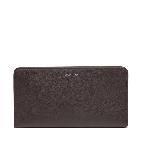 Portfel Calvin Klein. Brązowe portfele Calvin Klein, bez wzorów. Za 289.99 zł.