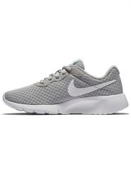Nike Buty "Tanjun" w kolorze jasnoszarym do biegania rozmiar: 32. Szare obuwie sportowe Nike, z materiału, bez zapięcia, do biegania. Za 127.35 zł.