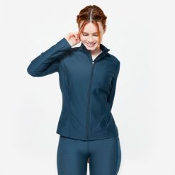 Bluza na zamek damska Domyos fitness. Niebieskie bluzy DOMYOS, s, bez wzorów, z elastanu, bez kaptura. Za 89.99 zł.