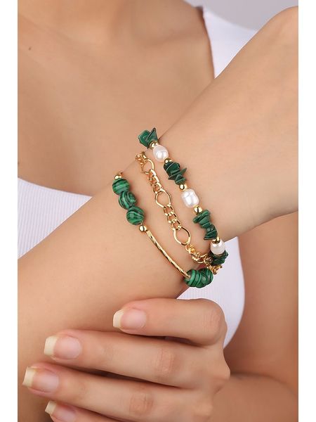 Pierres delicates Pozłacana bransoletka z malachitami rozmiar: onesize. Zielone bransoletki Pierres delicates, z malachitem, pozłacane. Za 104.89 zł.