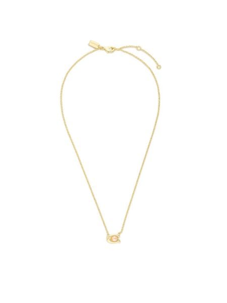 Coach Naszyjnik Pearl Signature C Pendant Necklace 37341916GLD651 Złoty. Żółte naszyjniki Coach, metalowe. Za 279.99 zł.
