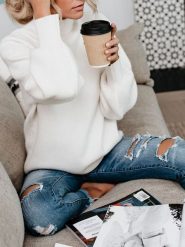 Milan Kiss Sweter w kolorze kremowym rozmiar: L. Brązowe swetry Milan Kiss, l, bez wzorów, bez ramiączek. Za 165.99 zł.