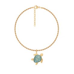 Bransoletka Łańcuch No.12 z Żółwiem z turkusową emalią, pozłacana. Niebieskie bransoletki Lilou, z kryształem, pozłacane. Za 258.00 zł.