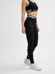 Damskie bawełniane legginsy o średnim kroju Hummel TE Maja. Czarne legginsy Hummel, xs, bez wzorów, z bawełny, z standardowym stanem. Za 161.50 zł.