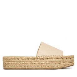 Espadryle Calvin Klein. Brązowe espadryle Calvin Klein, bez wzorów, bez obcasa, bez zapięcia. Za 449.99 zł.
