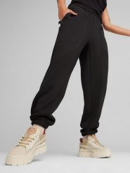 Puma Spodnie dresowe "Infuse" w kolorze czarnym rozmiar: M. Czarne spodnie dresowe Puma, m, bez wzorów, z dresówki. Za 152.98 zł.