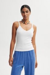 TOP CAMI BIAŁY M - Flawless. Białe topy Flawless, m, bez wzorów, z bawełny, bez kołnierzyka, bez ramiączek. Za 179.00 zł.