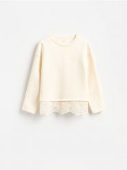 Bluza z ażurowymi wstawkami - złamana biel. Bluzy sportowe Reserved, l, w ażurowe wzory, z bawełny, bez kaptura. Za 139.99 zł.