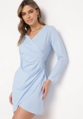 Niebieska Sukienka Kopertowa z Ozdobnym Marszczeniem Ohildria. Niebieskie sukienki Born2be, bez wzorów, eleganckie, bez kołnierzyka, bez ramiączek, mini, kopertowe. Za 59.99 zł.