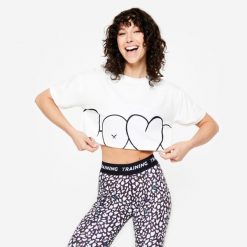 Koszulka fitness damska Domyos crop top loose. Koszulki sportowe DOMYOS, bez wzorów, z bawełny, bez ramiączek, na fitness i siłownię. W wyprzedaży za 49.99 zł.