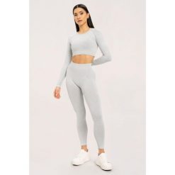 Legginsy fitness damskie Gym Glamour sprane. Białe legginsy GYM GLAMOUR, s, bez wzorów. Za 159.99 zł.
