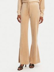 Juicy Couture Spodnie dresowe Christine JCWBJ125304 Beżowy Flared Leg. Brązowe spodnie dresowe Juicy Couture, m, bez wzorów, z dresówki. Za 219.99 zł.