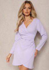Fioletowa Kopertowa Sukienka Drapowana w Talii Ejorunna. Fioletowe sukienki Renee, na imprezę, bez wzorów, eleganckie, bez kołnierzyka, bez ramiączek, mini, kopertowe. Za 64.99 zł.