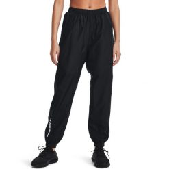 Spodnie dresowe damskie Under Armour Rush Woven Pant. Czarne spodnie dresowe Under Armour, xs, bez wzorów, z dresówki. Za 199.99 zł.