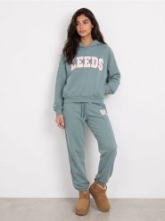 Bluza hoodie oversize z napisem - turkusowy. Niebieskie bluzy Sinsay, l, bez wzorów, bez kaptura. Za 49.99 zł.