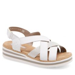 Sandały Rieker. Białe sandały Rieker, bez wzorów, bez obcasa, na koturnie, bez zapięcia. Za 299.99 zł.