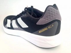 Damskie buty do biegania lekka konstrukcja ADIZERO RC 4 SHOES. Czarne trekkingi Adidas, z gumy, do biegania. Za 428.45 zł.