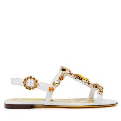 Sandały Dolce&Gabbana. Białe sandały Dolce&Gabbana, bez wzorów, bez obcasa, na płaskiej podeszwie, bez zapięcia. Za 3,869.00 zł.