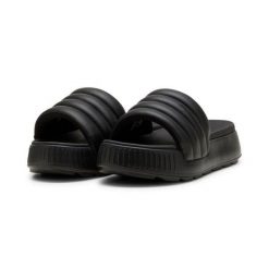 Puma Klapki Karmen Slide Puffy 39539901. Czarne klapki Puma, bez wzorów, z materiału, bez obcasa. Za 159.00 zł.