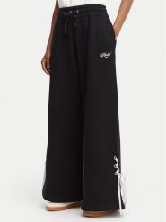 Reebok Spodnie dresowe Dominka RK25696CCW Czarny Regular Fit. Czarne spodnie dresowe Reebok, s, bez wzorów, z bawełny. Za 279.99 zł.