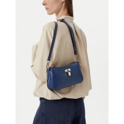 Torebka Nine West. Niebieskie torebki klasyczne Nine West, bez wzorów, bez dodatków. Za 229.99 zł.