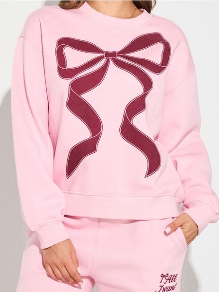 Bluza crewneck z nadrukiem - różowy. Czerwone bluzy Sinsay, l, bez wzorów, bez kaptura. Za 39.99 zł.