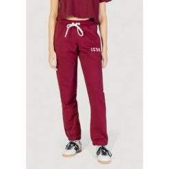 Spodnie Kobieta ICON. Czerwone spodnie dresowe ICON, bez wzorów. W wyprzedaży za 303.10 zł.