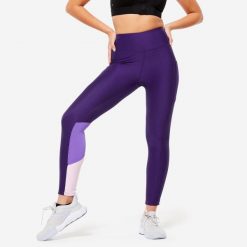 Legginsy fitness damskie Domyos. Fioletowe legginsy DOMYOS, l, bez wzorów, z elastanu, z podwyższonym stanem. W wyprzedaży za 59.99 zł.