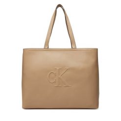 Torebka Calvin Klein Jeans. Brązowe shopper Calvin Klein Jeans, bez wzorów, z jeansu, bez dodatków. Za 319.99 zł.